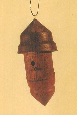 miniature birdbox; mahogany; Ø 2 a 2,8 x 6 cm